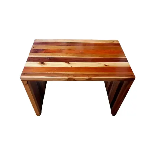 Coffee table in various shades of natural wood.